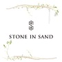 stone in sand