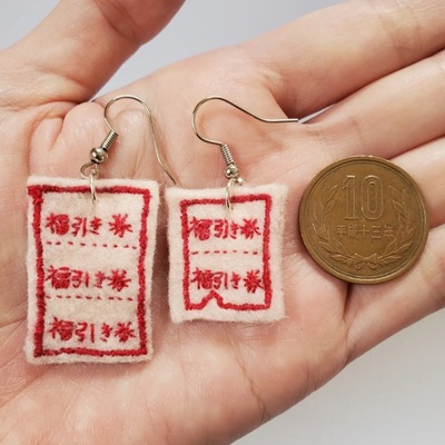 ニコちゃんキーホルダータッセルチャーム引揃い糸革タグハンドメイド